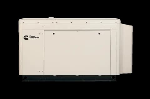 Cummins QuietConnect home standby generator in its weather-protective sound-insulated enclosure